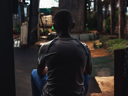 africa_young_man_sitting_back