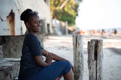 Girl in Kenya sitting side profile