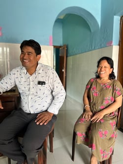 Station manager and shelter mother sitting and smiling in the shelter home.