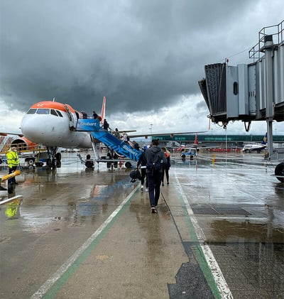 people boarding plane
