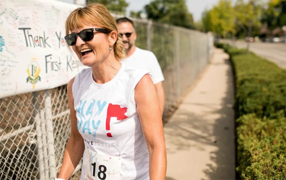 run_for_freedom_stop_human_trafficking_woman_smiling