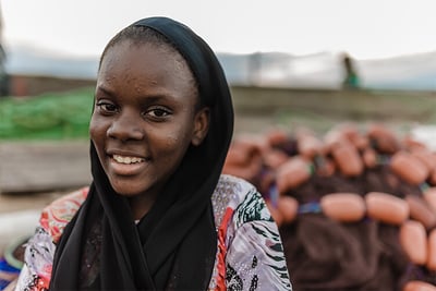 african girl wearing black scarf