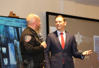 Sheriff Brown and John Kellner sharing about human trafficking at art event