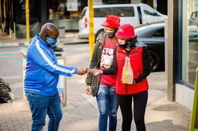 LJI staff hands out freedom project pamphlet 