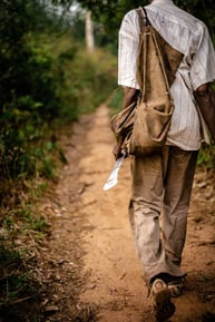 ghana_man_walking_village
