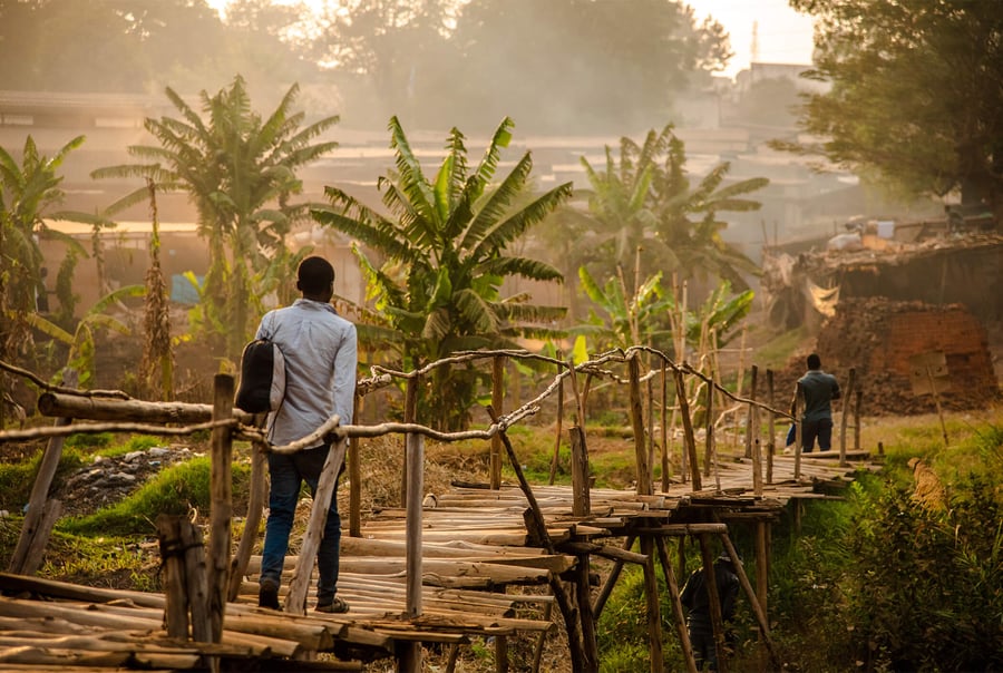 man-walking-across-bridge-2