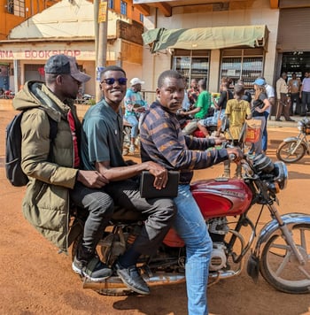 peter-and-faizo-on-bike