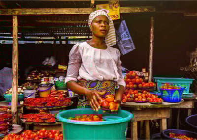 woman holding tomatoes-2