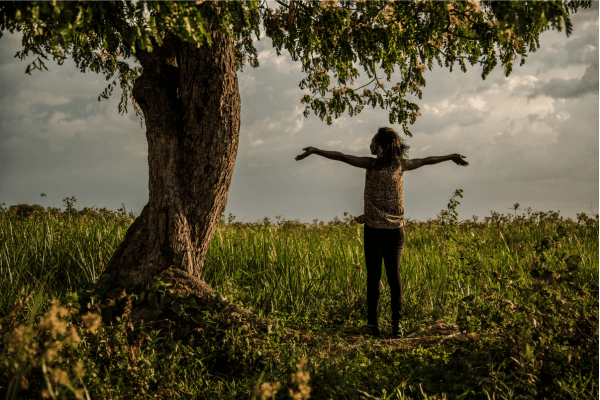 woman with hands outstretched