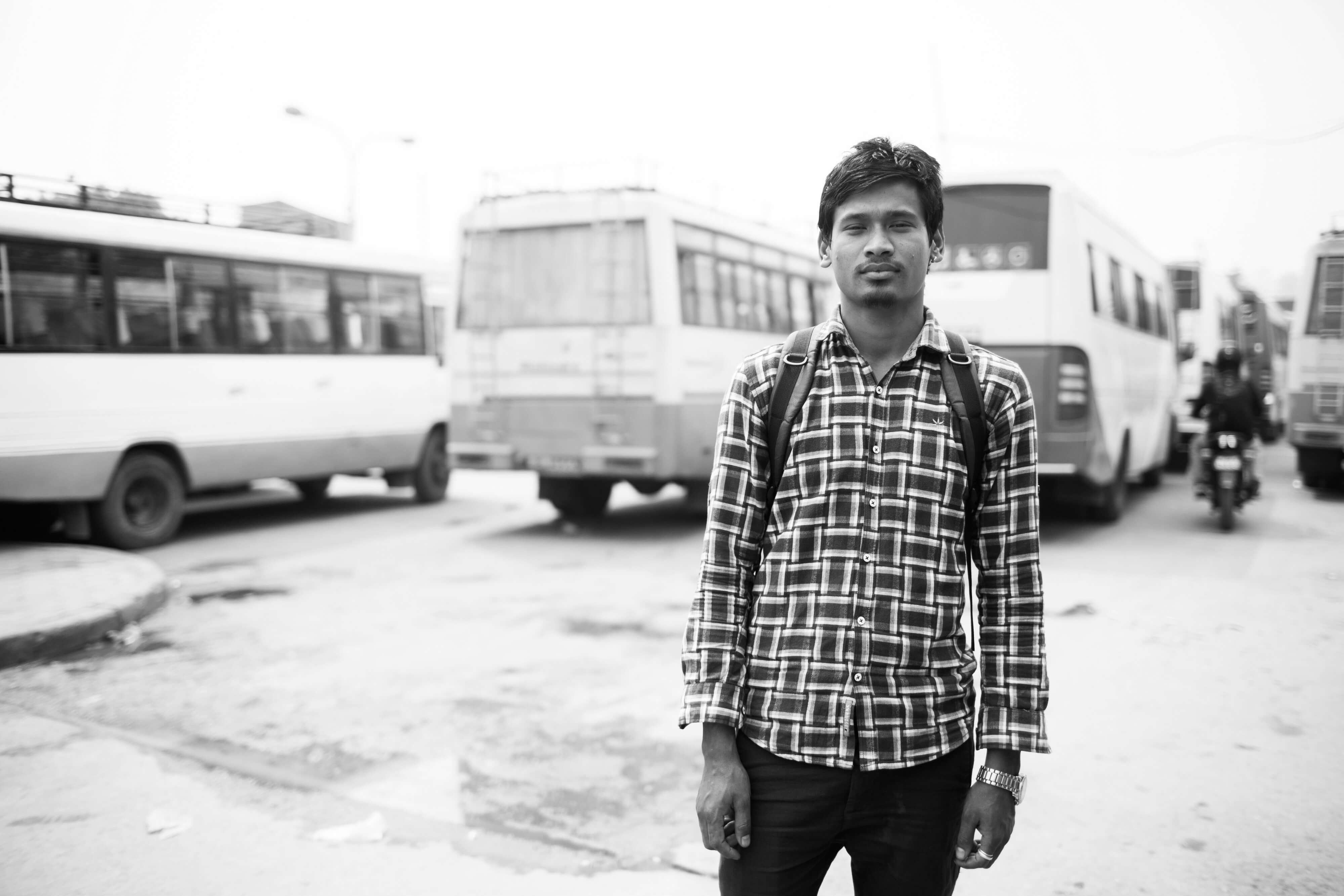 South Asian Love Justice monitor at bus station