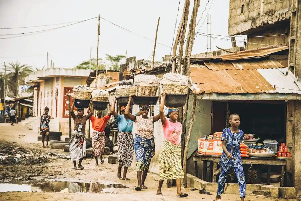 People carrying baskets on their heads