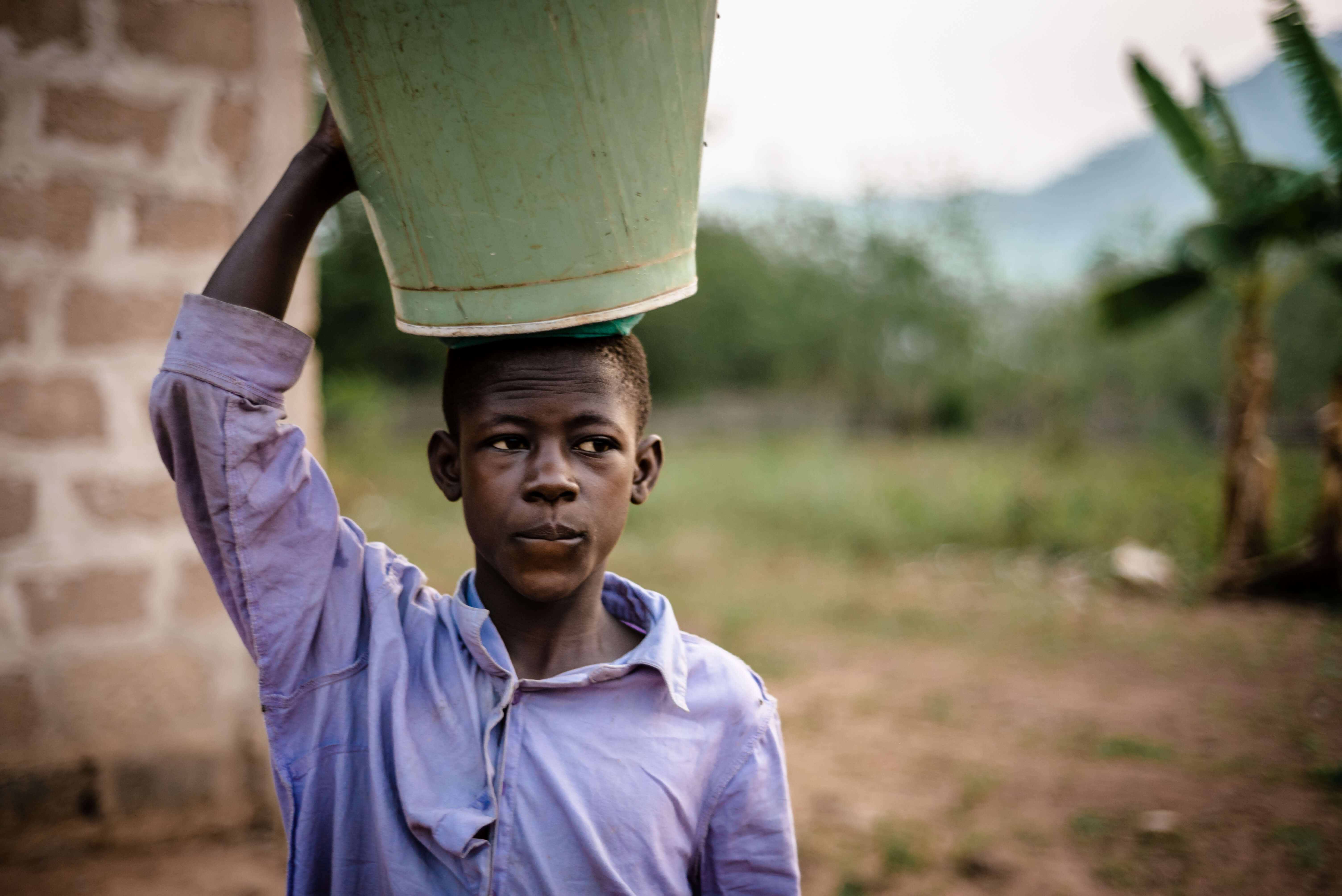 Boy carrying water