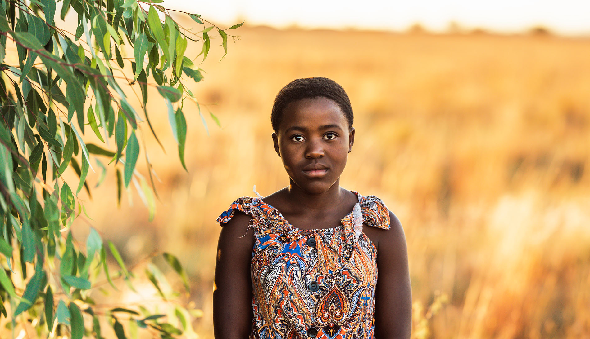 young African girl in a field